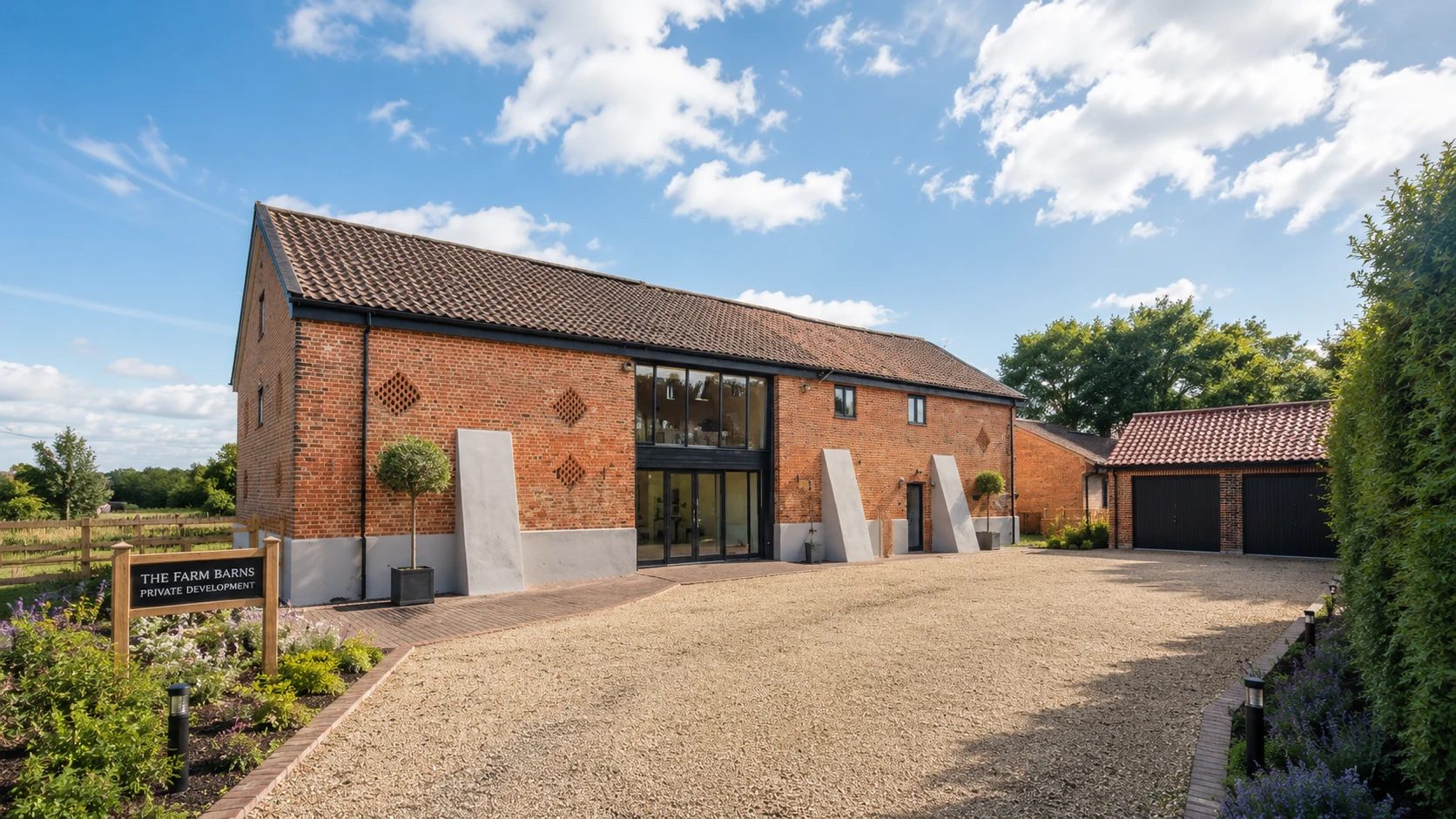 The Farm Barns exterior in warm daylight