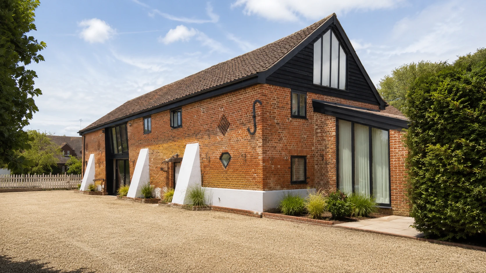 The Farm Barns side elevation and converted barn massing